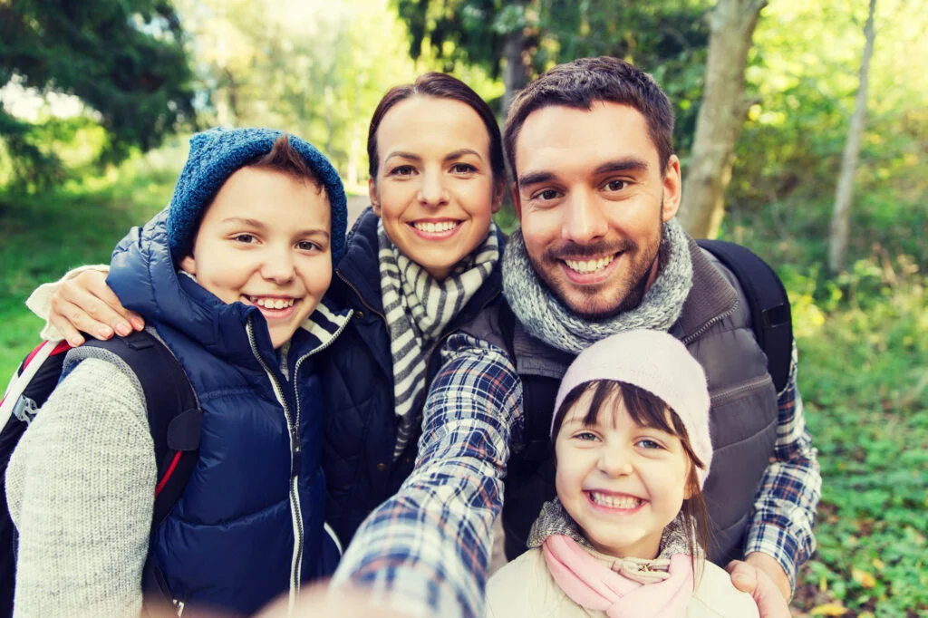 Family relaxing together in apartment